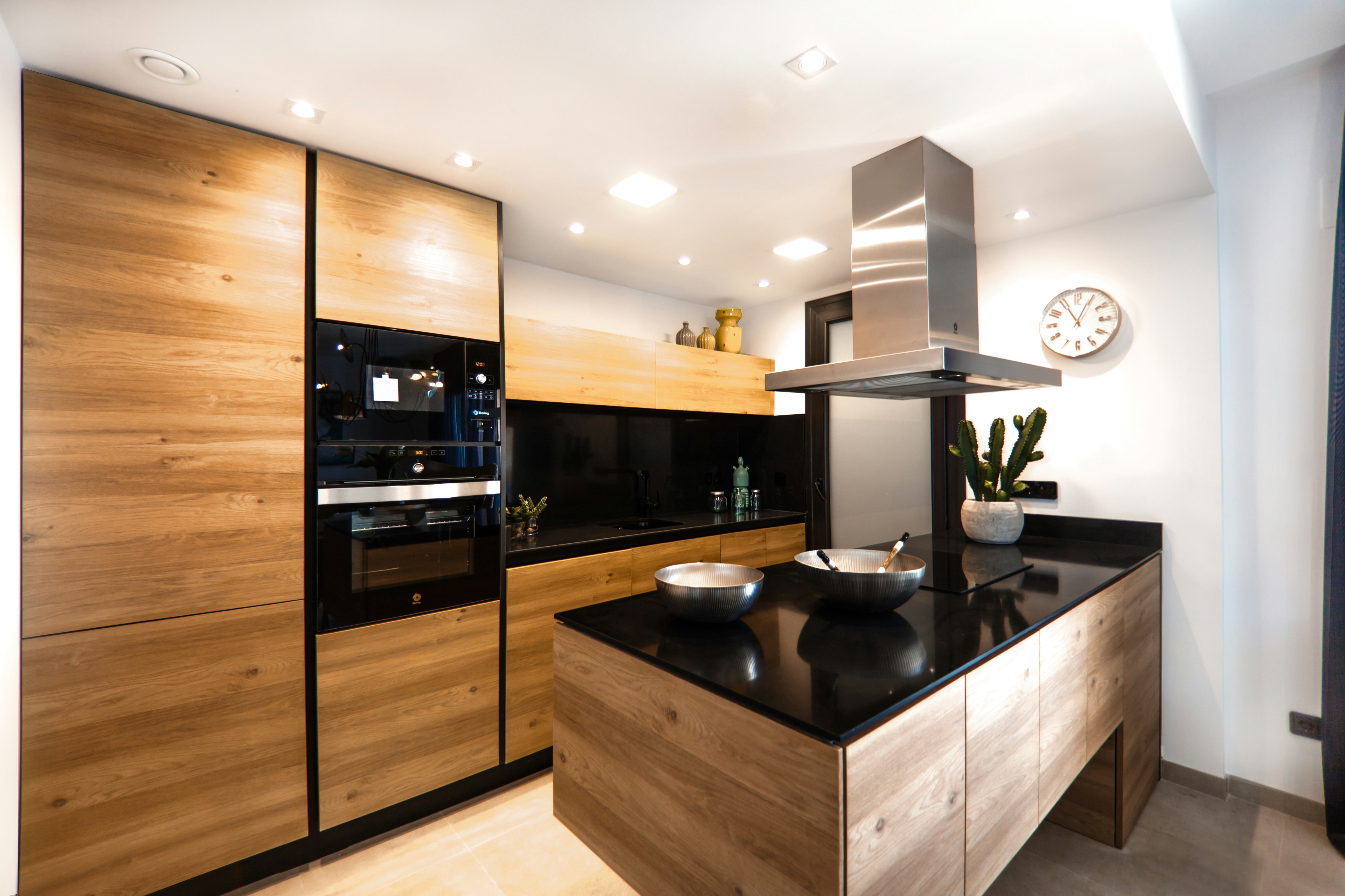 Wood Finish Kitchen with Black Island
